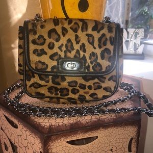 Cross body leopard print purse with silver strap